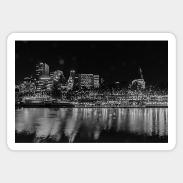 City at night, buildings, lights and corporate brands neon signs across Yarra River in monochrome Sticker by brians101